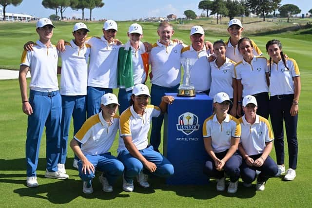 Team Europe captain Stephen Gallacher and his players players pose with the trophy after winning the Junior Ryder Cup in Rome. Picture: Alberto Pizzoli/AFP via Getty Images.