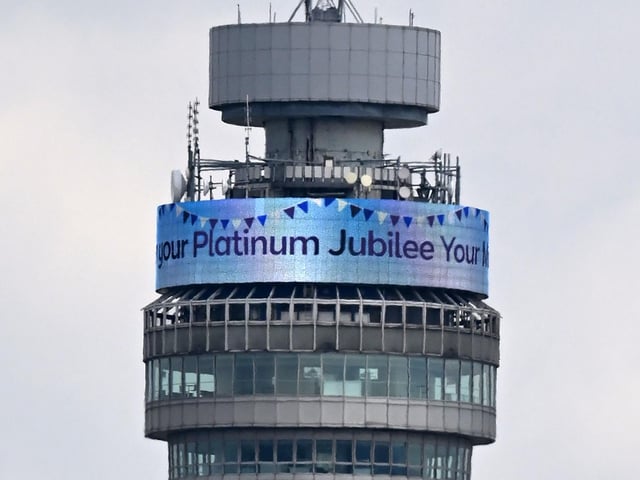 A message is pictured on the display atop the BT tower.