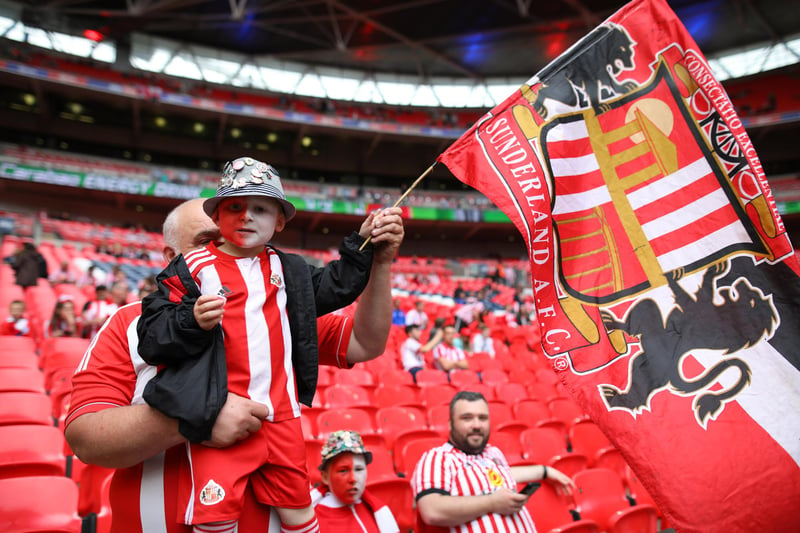 A young Sunderland fan enjoys the pre-match atmosphere ahead of the Sky Bet League One play-off final match between Charlton Athletic and Sunderland at Wembley Stadium on May 26, 2019.