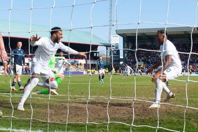 Connor Goldson (left) celebrates with Alfredo Morelos after his winning goal for Rangers against Dundee at Dens Park on Sunday. (Photo by Alan Harvey / SNS Group)
