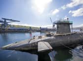 Police are investigating the unexplained death of a man at a nuclear submarine base.