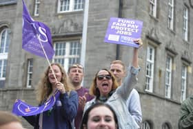 Striking college lecturers protest outside the Scottish Parliament. Image: Lisa Ferguson