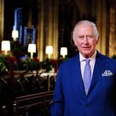 King Charles III delivers his first Christmas broadcast in the Quire of St George's Chapel at Windsor Castle (Picture: Victoria Jones/pool/Getty Images)