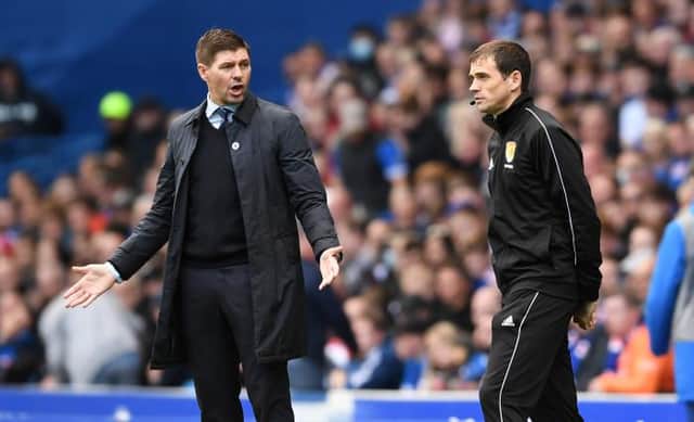 Rangers manager Steven Gerrard makes his feelings known to fourth official Steven Reid during his team's 1-1 draw against Motherwell at Ibrox. (Photo by Craig Foy / SNS Group)