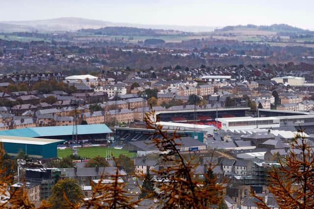 Dens Park in the foreground, with Tannadice beyond: The city of Dundee could lose its distinction of having two football grounds on the same street (Photo by Ross MacDonald / SNS Group)