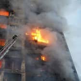 Strikes on residential areas in Kyiv killed at least two people early on March 15, emergency services said, as Russian troops intensified their attacks on the Ukrainian capital. (Photo by State Emergency Service of Ukraine / AFP)