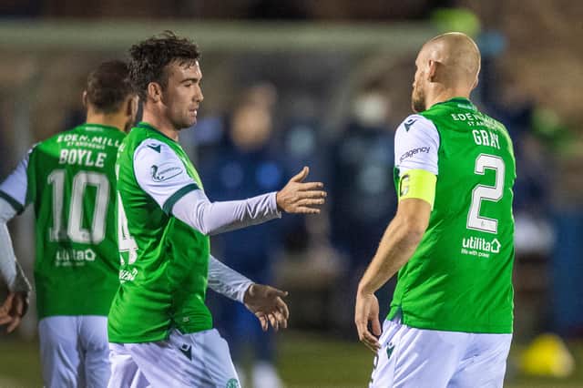 Hibernian's David Gray (right) celebrates his winner with Stevie Mallan during the Betfred Cup match against Forfar. Photo by Ross Parker / SNS Group