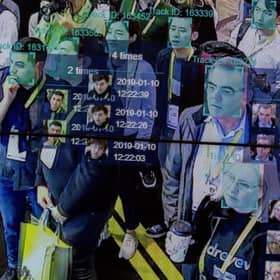 File photo: A live demonstration uses artificial intelligence and facial recognition in dense crowd spatial-temporal technology  (Photo by DAVID MCNEW/AFP via Getty Images)