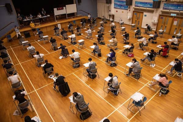Secondary school students take the Hong Kong Diploma of Secondary Education exams (HKDSE) in Creative Secondary School in Hong Kong. Secondary schools will resume face-to-face classes on 3 May.