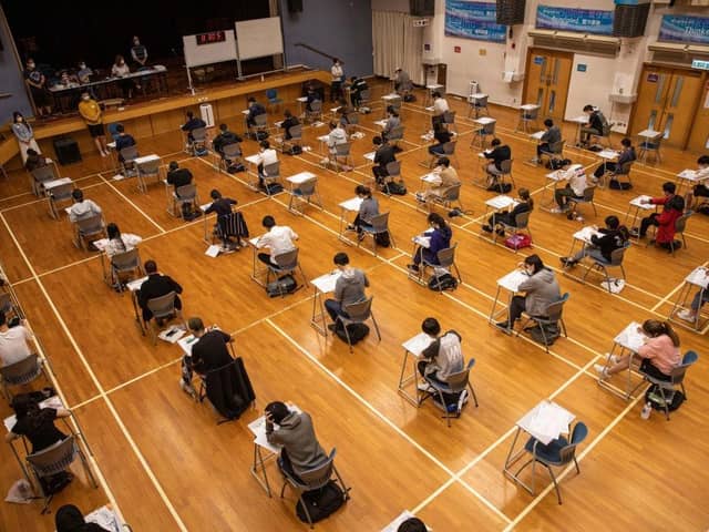 Secondary school students take the Hong Kong Diploma of Secondary Education exams (HKDSE) in Creative Secondary School in Hong Kong. Secondary schools will resume face-to-face classes on 3 May.
