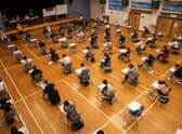 Secondary school students take the Hong Kong Diploma of Secondary Education exams (HKDSE) in Creative Secondary School in Hong Kong. Secondary schools will resume face-to-face classes on 3 May.