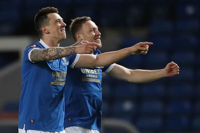 Rangers midfielders Ryan Jack and Scott Arfield celebrate at full-time after the 6-4 aggregate defeat of Borussia Dortmund. (Photo by Ian MacNicol/Getty Images)