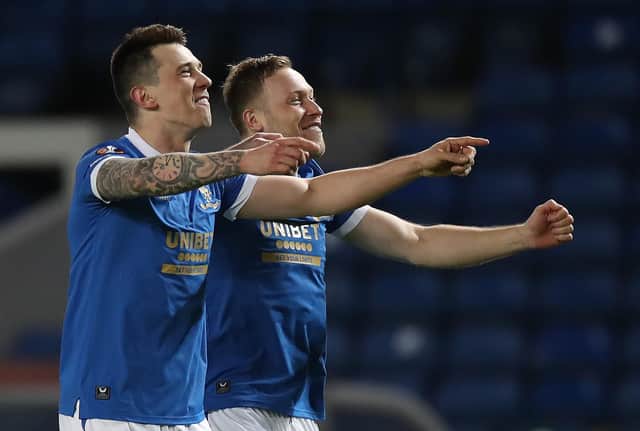Rangers midfielders Ryan Jack and Scott Arfield celebrate at full-time after the 6-4 aggregate defeat of Borussia Dortmund. (Photo by Ian MacNicol/Getty Images)