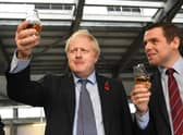 Prime Minister Boris Johnson with Douglas Ross on a campaigning visit