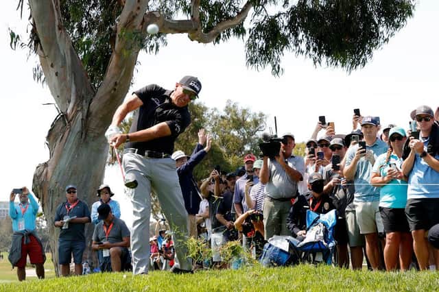 Phil Mickelson plays from the rough on the 15th hole as a gallery of fans look on during the first round of the 2021 US Open at Torrey Pines in San Diego. Picture: Ezra Shaw/Getty Images.