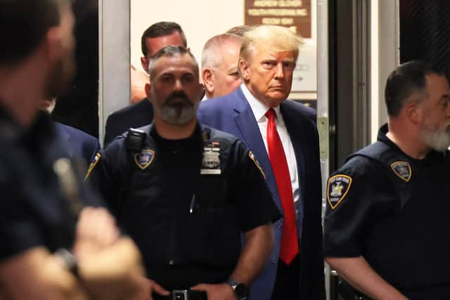 Former US President Donald Trump arrives for his arraignment hearing in New York City