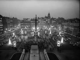 Glasgow's George Square, as viewed from the City Chambers, lit up by festive decorations in 1963.