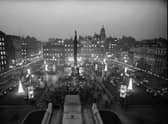 Glasgow's George Square, as viewed from the City Chambers, lit up by festive decorations in 1963.