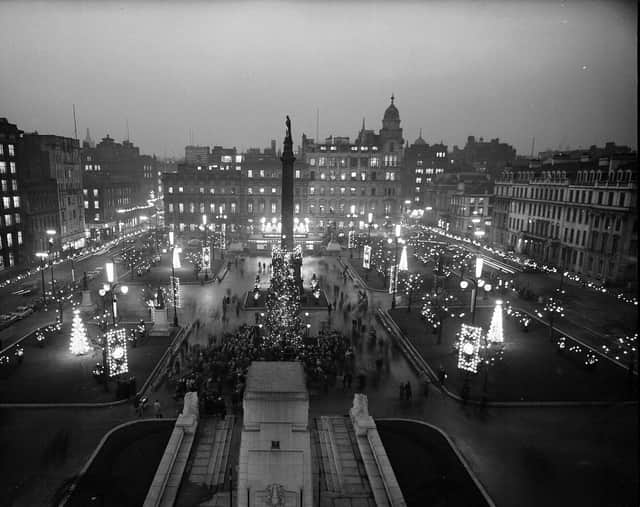 Glasgow's George Square, as viewed from the City Chambers, lit up by festive decorations in 1963.