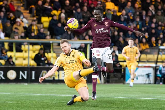 Livingston's Nicky Devlin stops Hearts' Garang Kuol during the 0-0 draw in West Lothian.