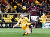 Livingston's Nicky Devlin stops Hearts' Garang Kuol during the 0-0 draw in West Lothian.