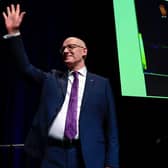 First Minister and SNP leader John Swinney acknowledges applause after addressing the SNP campaign Conference at Edinburgh International Conference Centre on Saturday (Picture: Jeff J Mitchell/Getty Images)