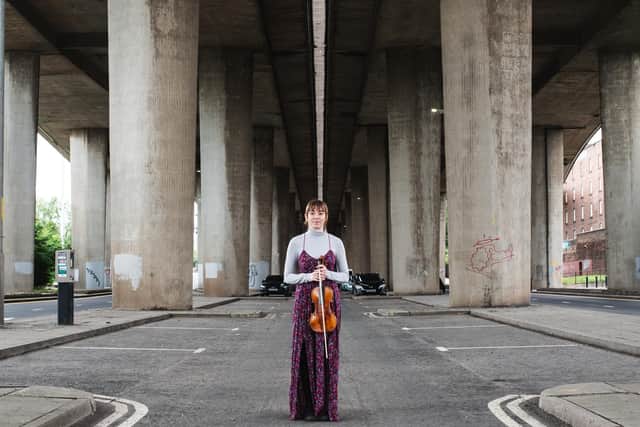 Violinist Sarah Wagner instigated the 'Under the Bridge' project after recording a solo performance beneath the Kingston Bridge in June.