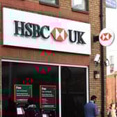 EMBARGOED TO 0001 WEDNESDAY APRIL 13 File photo dated 24/01/17 of a customer using a cash machine at a branch of HSBC in Tooting Broadway, London, as people experiencing domestic abuse can now walk into any HSBC branch in the UK to access a safe space and seek support and advice.
