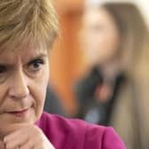 Nicola Sturgeon came under pressure over care home deaths