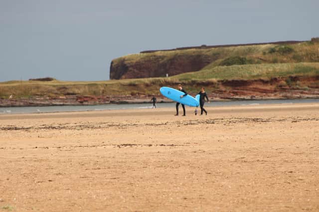 Dunbar's Belhaven Beach is a popular destination for surfers. Pic: Contributed