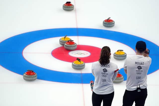 Great Britain's Jennifer Dodds and Bruce Mouat look on during the Mixed Doubles Bronze Medal on day four of the Beijing 2022 Winter Olympic Games at the National Aquatics Centre in China.