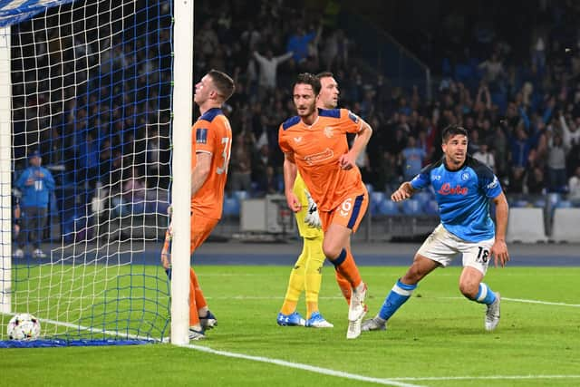 Napoli's Giovanni Simeone leaves the Rangers defence in despair after scoring his second inside 16 minutes. (Photo by ANDREAS SOLARO/AFP via Getty Images)