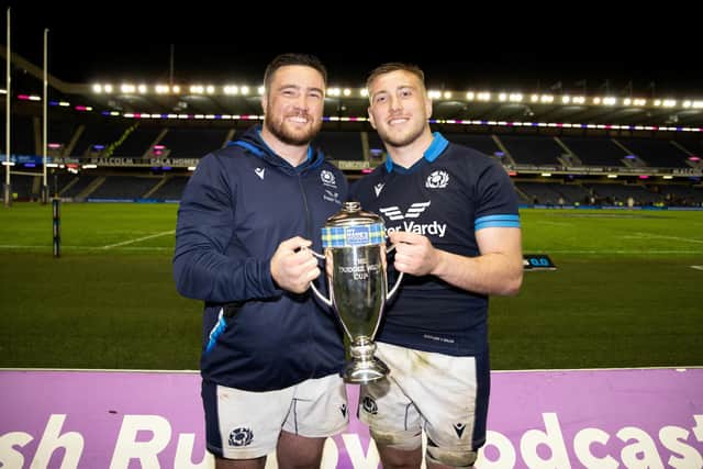 Zander Fagerson, left, and brother Matt with the Doddie Weir Cup after Scotland's win over Wales. (Photo by Craig Williamson / SNS Group)