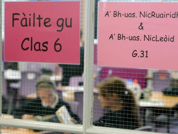 An SNP manifesto pledge about Gaelic education in Edinburgh appears to conflict with the city council's plans, says John McLellan