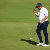 Shane Lowry reacts after holing a par putt on the 18th in the third round of the 149th Open at Royal St George’s. Picture: Andrew Redington/Getty Images.