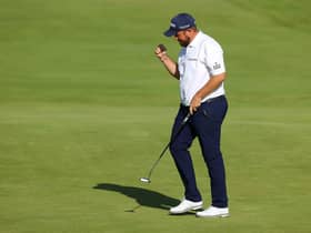 Shane Lowry reacts after holing a par putt on the 18th in the third round of the 149th Open at Royal St George’s. Picture: Andrew Redington/Getty Images.