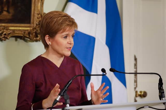 Nicola Sturgeon says the NHS has escaped being "overwhelmed"