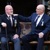 Falklands War veterans Bill McDowall (left) and  Norman 'Mac' McDade in the grounds of The Erskine Home in Bishopton, Renfrewshire, as they meet for the first time since the war. PIC: Andrew Milligan/PA Wire