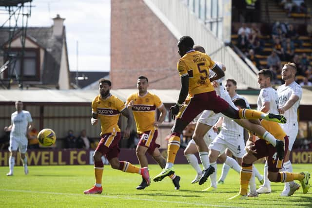 Bevis Mugabi heads home to make it 2-1 to Motherwell.