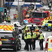 Police on the street after the stabbing in Glasgow last year (Pic: John Devlin)