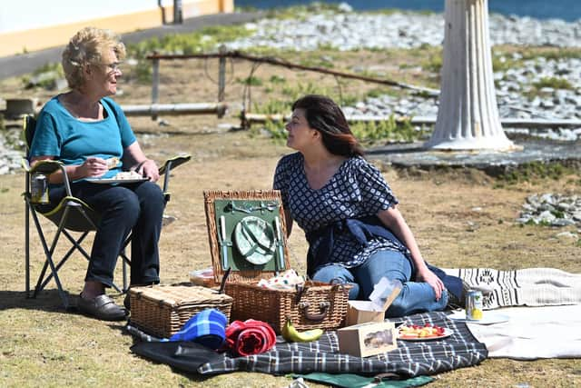 Margaret Purves and her daughter, Dani Garavelli, having a picnic on Ailsa Craig. Picture: John Devlin