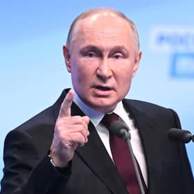 Russian President and presidential candidate Vladimir Putin meets with the media at his campaign headquarters in Moscow. Picture: Natalia Kolesnikova/AFP via Getty Images