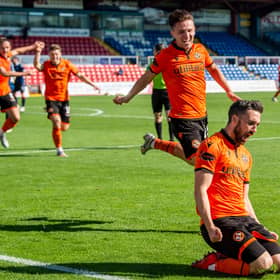 Nicky Clark celebrates netting the winning goal for Dundee United. Picture: SNS