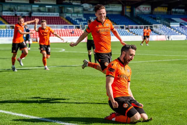 Nicky Clark celebrates netting the winning goal for Dundee United. Picture: SNS