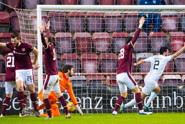 Regan Tumilty wheels away to make it 3-0 for Raith, much to the disgust of the Hearts players.