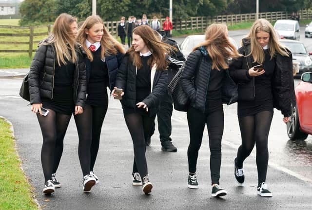 Pupils arrive at Kelso High School on the Scottish Borders as schools in Scotland start reopening on Tuesday amid concerns about the safety of returning to the classroom during the coronavirus pandemic. PA Photo. Picture date: Tuesday August 11, 2020. See PA story EDUCATON Schools. Photo credit should read: Owen Humphreys/PA Wire 