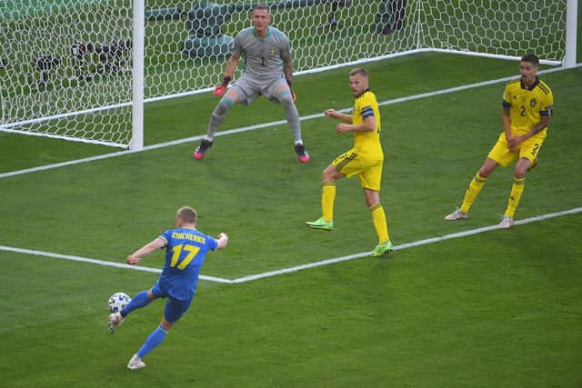 Oleksandr Zinchenko opens the scoring for rank outsiders Ukraine in their last 16 victory over Sweden at Hampden on Tuesday night. (Photo by ANDY BUCHANAN/POOL/AFP via Getty Images)