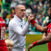 Celtic's Scott Brown (left) with Aberdeen's Shay Logan in Settember 2018. (Picture: SNS)