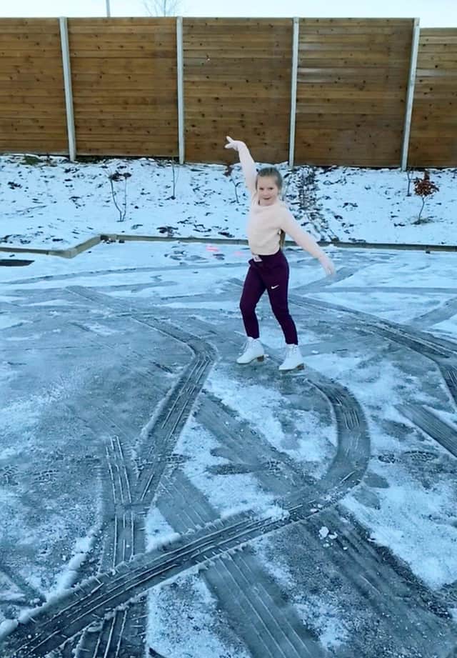 Nine-year-old Madison Galt figure skating on her frozen street in East Kilbride