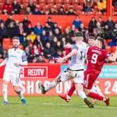 Christian Ramirez scores to make it 2-0 to Aberdeen.